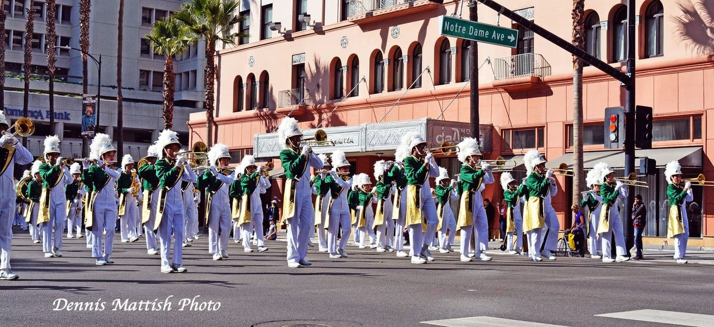Brass band marching down San Jose streets